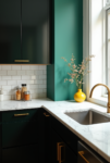 Kitchen styling countertops with white marble, dark cabinets, gold hardware, and a yellow vase adding contrast against a bold green wall.
