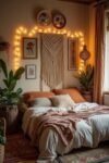 Burnt Orange Bedroom Color Combinations: The Best Shades to Pair for a Stylish Retreat Cozy bedroom with string lights, plants, and macramé art creating warm Boho Bedroom Wall Décor above the bed.