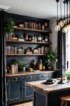Bookish Kitchen Decor: Literary Ideas for a Dark Academia Space Shelves of old books, glass jars, and greenery above black cabinets in a moody Dark Academia Kitchen.