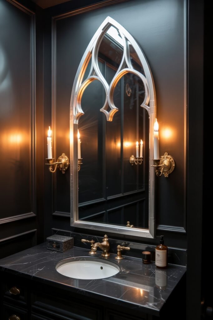 Gothic Bathroom Ideas: Genius Touches for Moody Glam 8 Sophisticated black vanity with brass fixtures and a pointed arch mirror flanked by candle sconces, set against paneled walls, strongly reflecting Gothic Bathroom Ideas.
