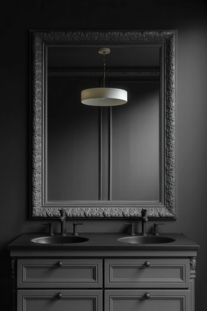 Gothic Bathroom Ideas: Genius Touches for Moody Glam 10 Matte black double sink vanity with matching ornate mirror and minimalist pendant light, exemplifying a refined Dark & Moody Bathroom Theme with symmetrical balance.