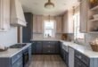 Bright kitchen with natural light featuring two tone kitchen cabinets in light wood and deep charcoal, white countertops, farmhouse sink, and woven decor accents.