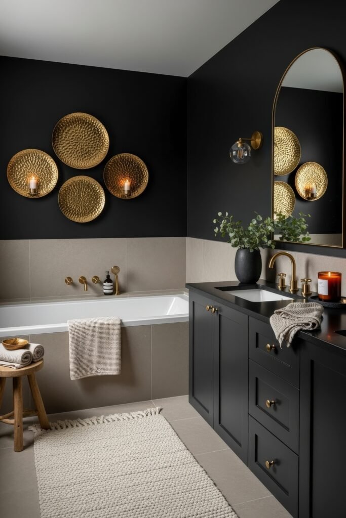 Black and Gold Bathroom Decor Ideas for Luxe Everyday Calm 19 Sophisticated space with a black vanity, gold faucet, wall-mounted gold candleholders, and a neutral bathtub area accented by textured beige details.