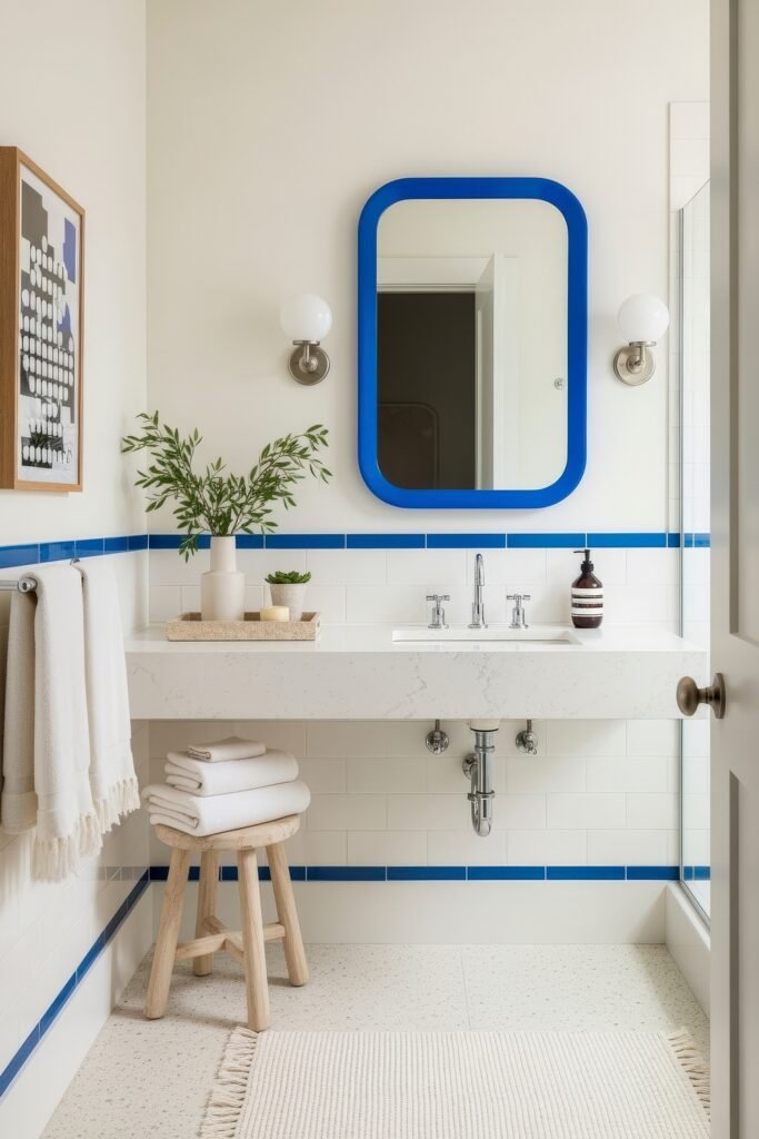 Blue Bathroom Decor: Fresh, Wow-Worthy Ideas 24 Bright bathroom with clean white tiles, vivid blue accents, and simple vanity styling for a crisp blue bathroom decor.