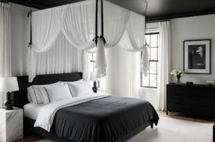 Modern bedroom with a black canopy bed dressed in white and charcoal bedding, framed by sheer drapes, black furniture, and a minimalist black-and-white artwork.