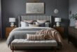 Grey bedroom ideas for a calm, stylish retreat 256 Elegant grey bedroom with a tufted headboard, layered bedding in grey and blush tones, wooden side tables, and modern decor accents.