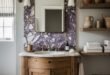 Calacatta Viola Bathroom Ideas for a Richer Look 164 Rustic bathroom vanity with curved wood cabinet and marble sink beneath a Calacatta Viola stone accent wall and open shelves with pottery and towels