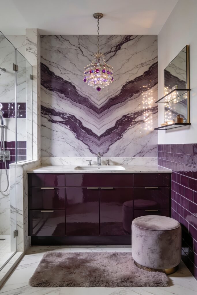 Calacatta Viola Bathroom Ideas for a Richer Look 11 Moody glam bathroom with glossy plum vanity and crystal chandelier against a bookmatched Calacatta Viola marble wall with mauve tile accents